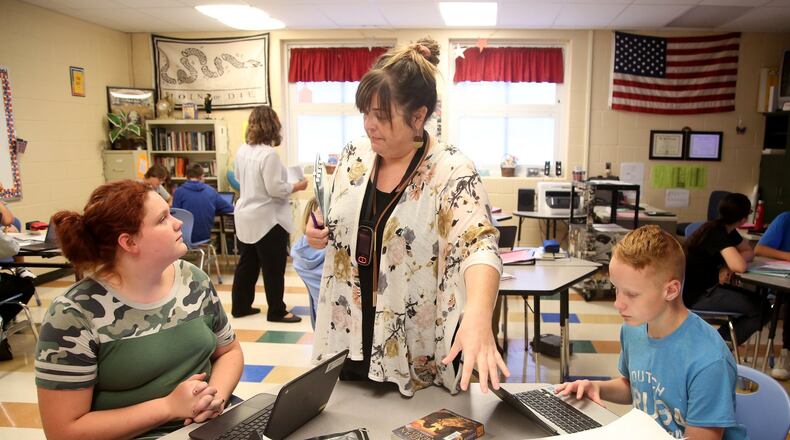 Jennifer Howard, an eighth-grade social studies teacher at Brookville Intermediate School, works with her class Thursday, the same day 2018-19 state report cards were released. The state puts heavy emphasis on how much year-over-year progress schools make, and a number of local schools, including Brookville, earned an “A” on that component of the report card. LISA POWELL / STAFFLISA POWELL / STAFF