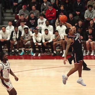 Dayton's De'Shayne Montgomery dunks in the first half against Saint Joseph’s on Saturday, Jan. 24 2026, at Hagan Arena in Philadelphia. David Jablonski/Staff