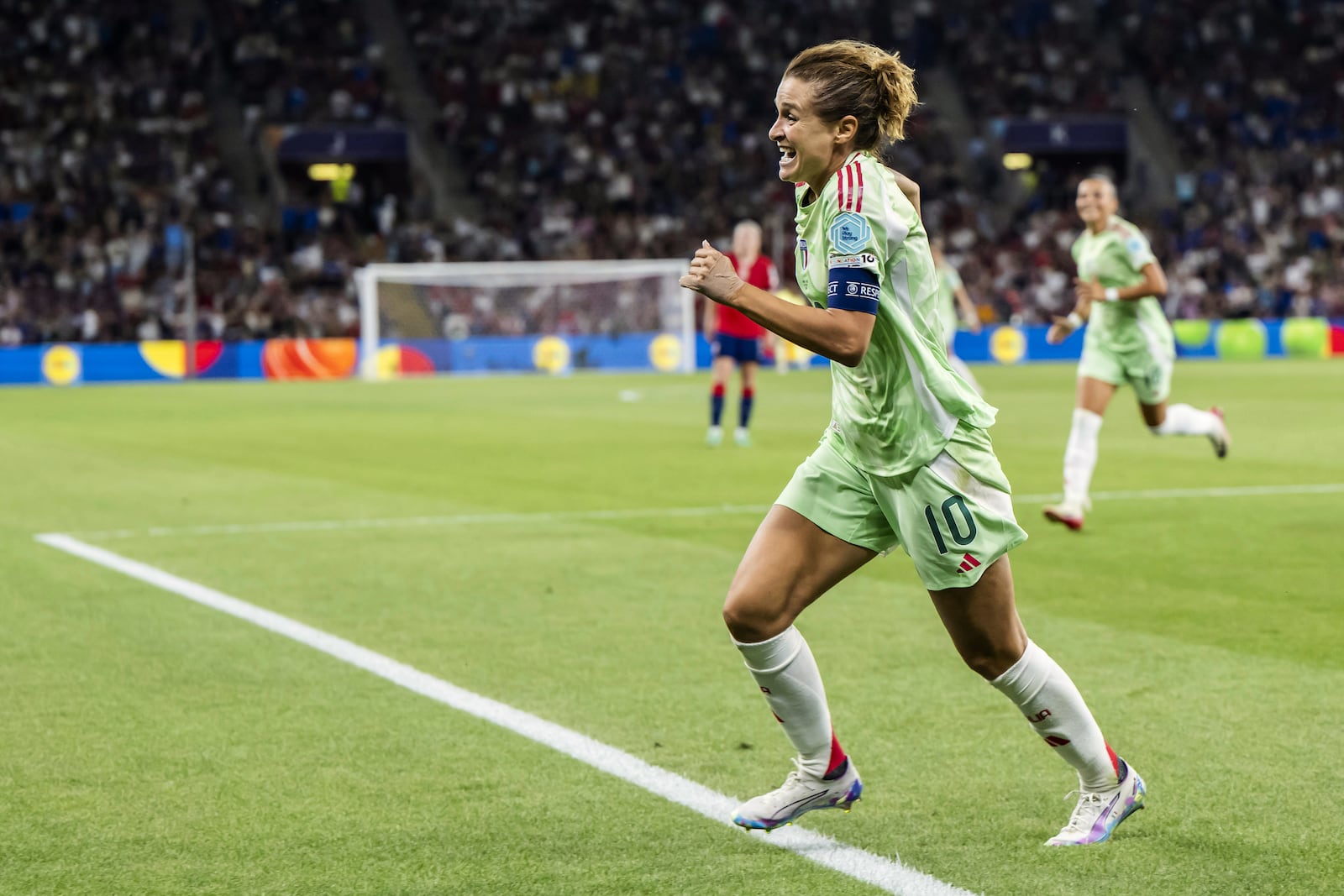Italy's Cristiana Girelli celebrates after scoring the opening goal during the Women's Euro 2025 quarterfinals soccer match between Norway and Italy at Stade de Geneve in Geneva, Switzerland, Wednesday, July 16, 2025. (Martial Trezzini/Keystone via AP)