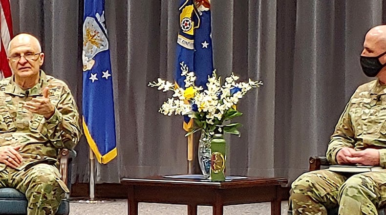 Gen. Arnold W. Bunch Jr. (left), Air Force Materiel Command commander, and Chief Master Sgt. David Flosi, AFMC command chief, answer questions during the AFMC Town Hall on Jan. 7. U.S. AIR FORCE PHOTO/JERRY BYNUM