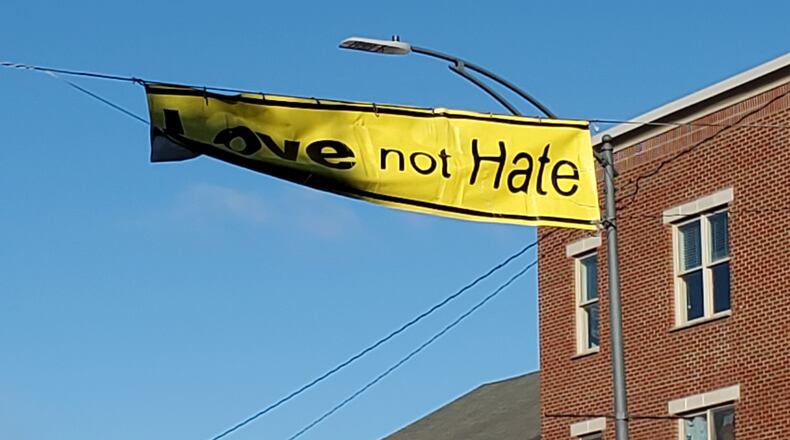 The Love Not Hate banner was set across High Street Monday as a reminder to all to not let political differences get in the way of discussion and cooperation. CONTRIBUTED/BOB RATTERMAN