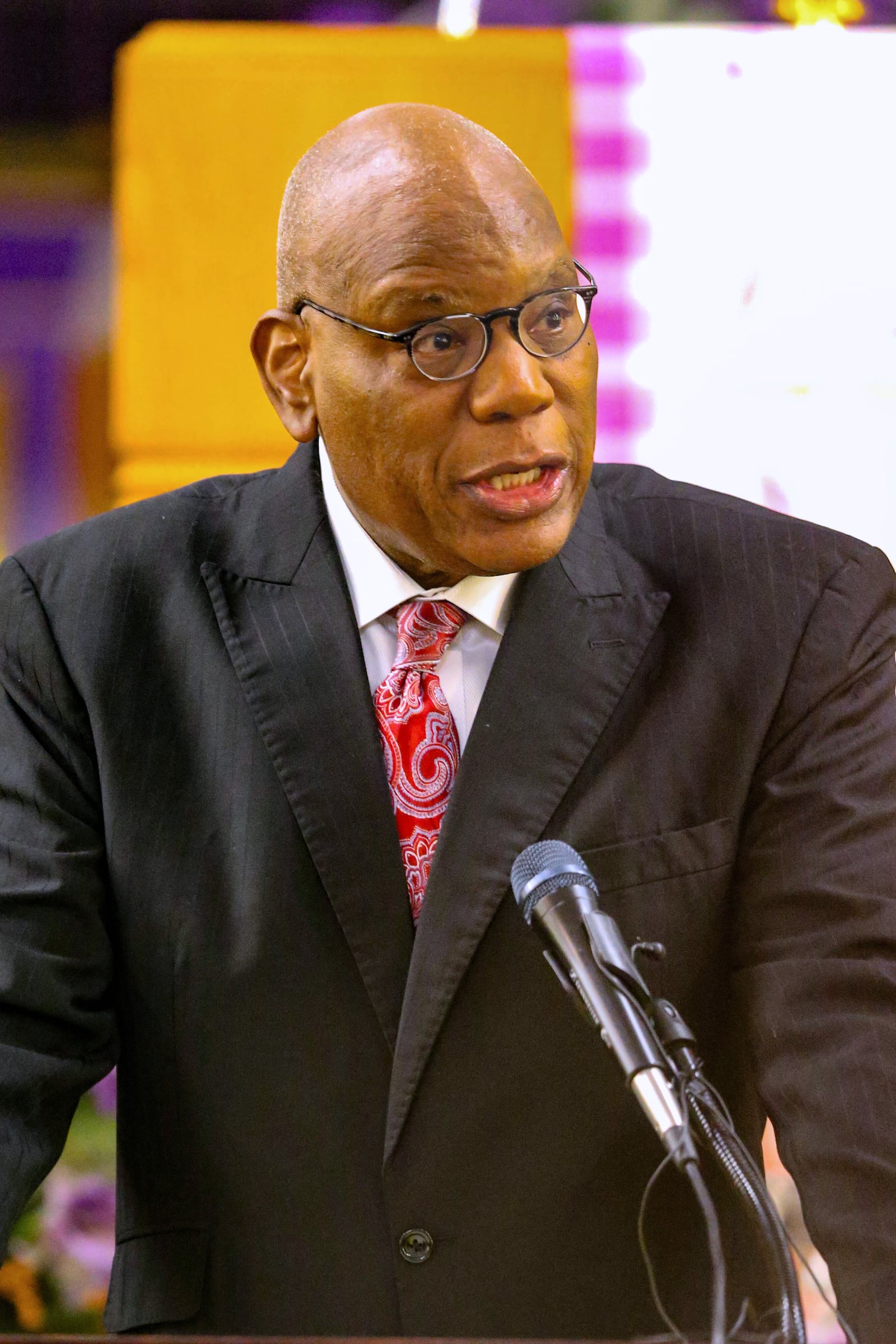 Rev. Dr. R.B. Holmes, Jr., pastor, addresses the Bethel Missionary Baptist Church congregation about the shooting at Florida State University before a Good Friday service, Tallahassee, Fla., Friday, April 18, 2025. (AP Photo/Gary McCullough)