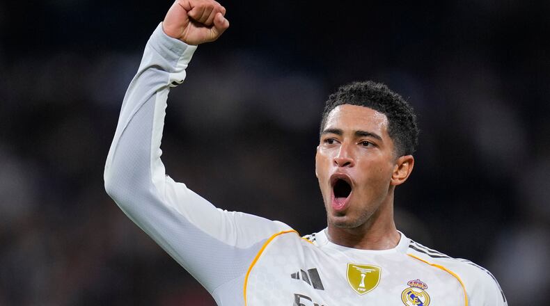 Real Madrid's Jude Bellingham celebrates after scoring his side's third goal during the Spanish La Liga soccer match between Real Madrid and Valencia in Madrid, Spain, Saturday, Nov. 1, 2025. (AP Photo/Manu Fernandez)