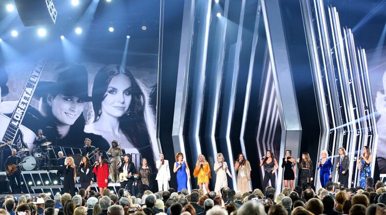 NASHVILLE, TENNESSEE - NOVEMBER 13: (FOR EDITORIAL USE ONLY) Kimberly Schlapman and Karen Fairchild of musical group Little Big Town, Sara Evans, Crystal Gayle, Jennifer Nettles, Reba McEntire, Carrie Underwood, Dolly Parton, Martina McBride, Gretchen Wilson, Amanda Shires and Maren Morris of The Highwomen, Tanya Tucker, Brandi Carlile and Natalie Hemby of The Highwomen perform onstage during the 53rd annual CMA Awards at the Bridgestone Arena on November 13, 2019 in Nashville, Tennessee. (Photo by Terry Wyatt/Getty Images,)