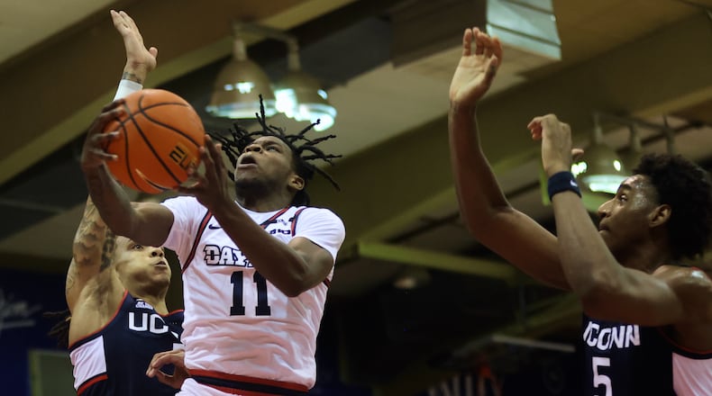 Dayton's Malachi Smith shoots against Connecticut in the Maui Invitational on Wednesday, Nov. 27, 2024, at the Lahaina Civic Center. David Jablonski/Staff