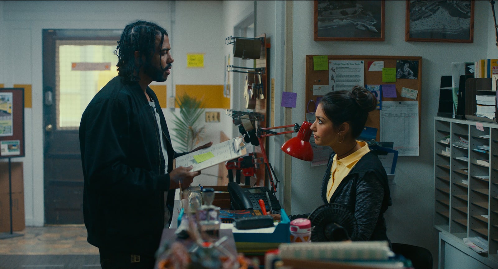 Daveed Diggs as “Collin” and Janina Gavankar as “Val” in BLINDSPOTTING. Photo by: Robby Baumgartner.