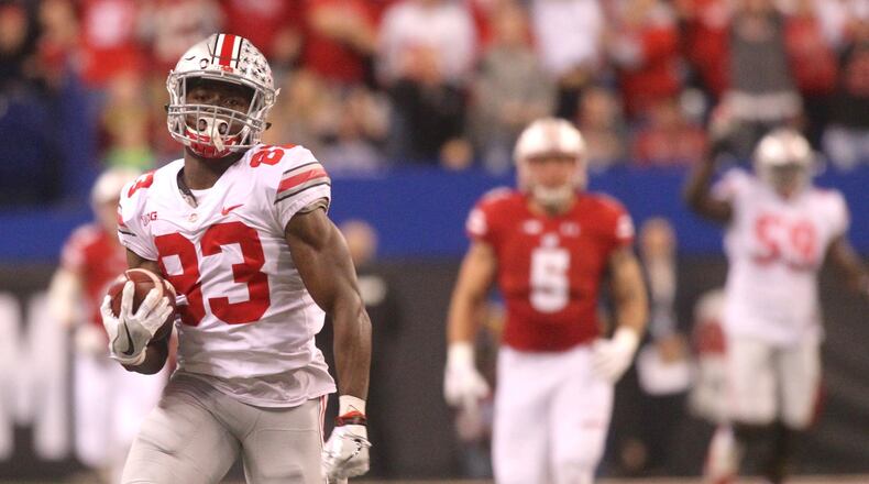 Ohio State’s Terry McLaurin runs after a catch for a touchdown against Wisconsin in the Big Ten Championship on Saturday, Dec. 2, 2017, at Lucas Oil Stadium in Indianapolis, Ind. David Jablonski/Staff