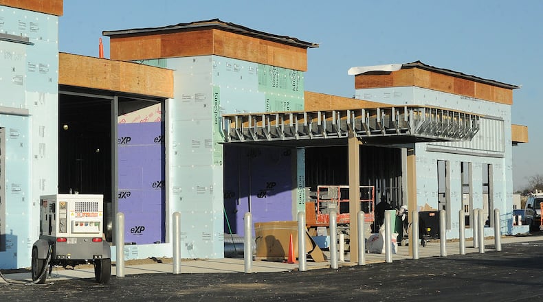A Premier Health medical office building under construction at 2066 W. Main St. in Xenia will house obstetrics and gynecology providers, primary care, and laboratory services when it opens in spring 2023. MARSHALL GORBY\STAFF