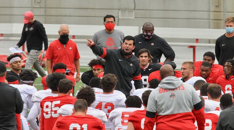 Ohio State's Ryan Day talks to his players during practice at Ohio Stadium on Saturday, Oct. 3, 2020, in Columbus. David Jablonski/Staff