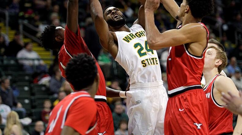Wright State senior guard Mark Alstork draws a crown in the paint during the first half of Saturday’s 80-75 loss to Youngstown State. CONTRIBUTED BY TIM ZECHAR