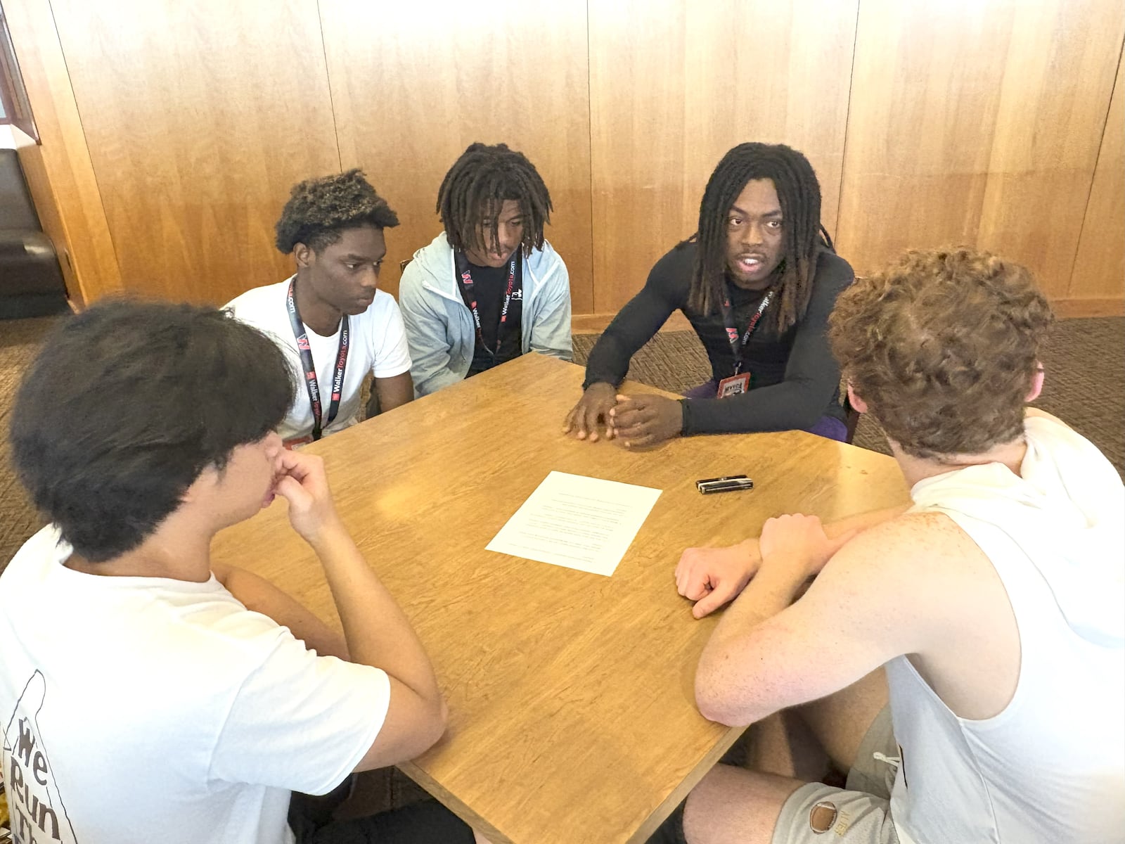 One of  the 7-on-7 Social Justice round table discussions featuring Alter High and Middletown High football players in the Presidents Lounge at UD Arena Wednesday. Pictured left to right: Alter's Miguel Delgado (Alter), Middletown's Dante Williams, Caron Spicer and Justin Lincoln and Alter's James Brooks. TOM ARCHDEACON / CONTRIBUTED PHOTO