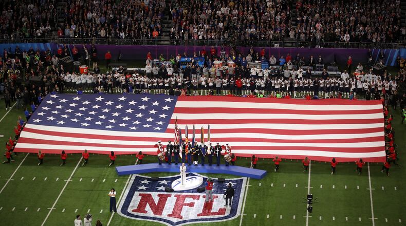 MINNEAPOLIS, MN - FEBRUARY 04: Pink sings the national anthem prior to Super Bowl LII between the New England Patriots and the Philadelphia Eagles at U.S. Bank Stadium on February 4, 2018 in Minneapolis, Minnesota. (Photo by Christian Petersen/Getty Images)