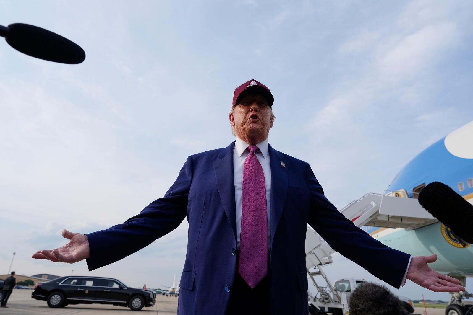 President Donald Trump speaks to reporters after arriving on Air Force One, Tuesday, June 10, 2025, at Joint Base Andrews, Md. (AP Photo/Alex Brandon)