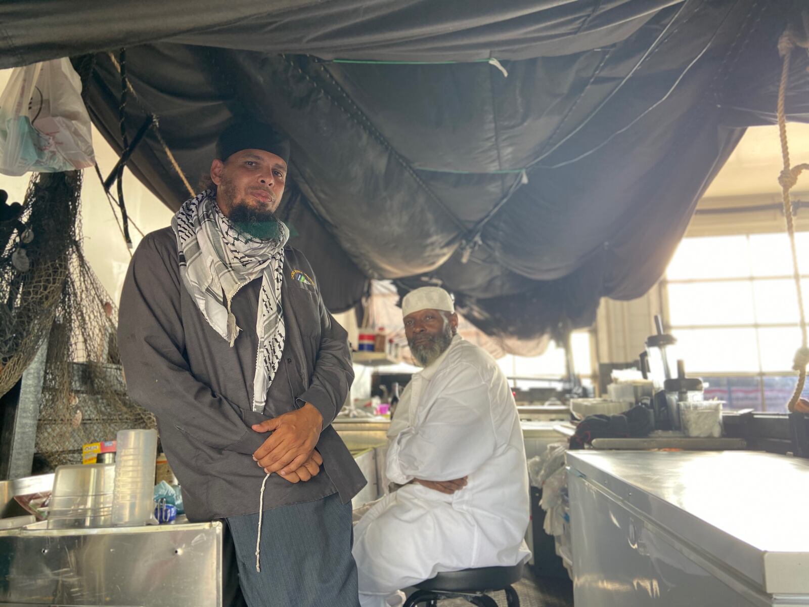 Jamiyl Al-Haniyf and Nasrrudiyn Abdul Hakiym opened The Black Pearl, an open-air food truck serving Montgomery County, this season. KAYLEE HARTER/STAFF