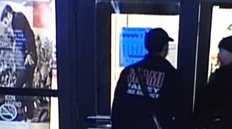 Three masked robbers escaped Wednesday night after a diamond heist at a Dayton Mall area jewelry store in Miami Twp. STAFF