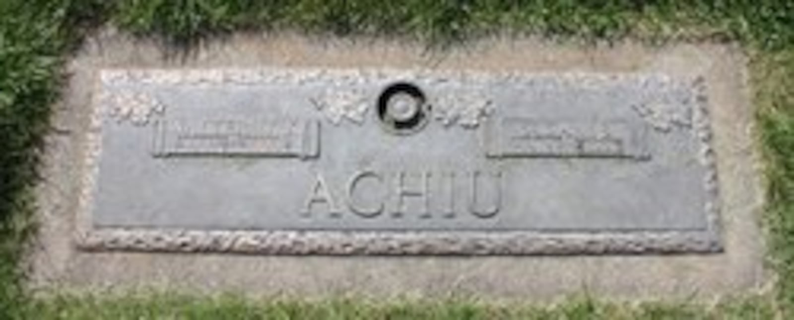 The unadorned marker on the grave of Walter “Sneeze” Achiu and his wife Susan at the Springfield Memorial Garden in Springfield, Oregon. CONTRIBUTED PHOTO