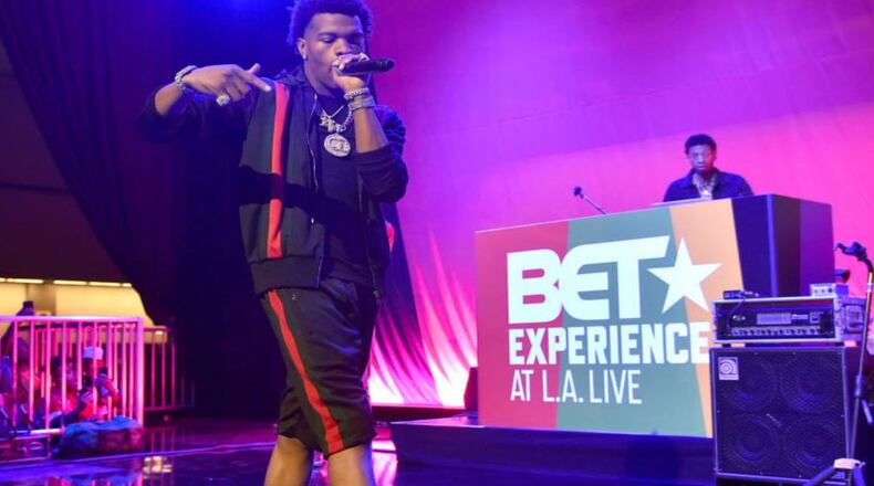 Rapper Lil Baby was performing in Birmingham when shots reportedly rang out Saturday night.