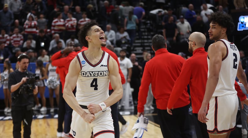 Dayton's Koby Brea celebrates after a victory against Nevada in the first round of the NCAA tournament on Thursday, March 21, 2024, at the Delta Center in Salt Lake City, Utah. David Jablonski/Staff