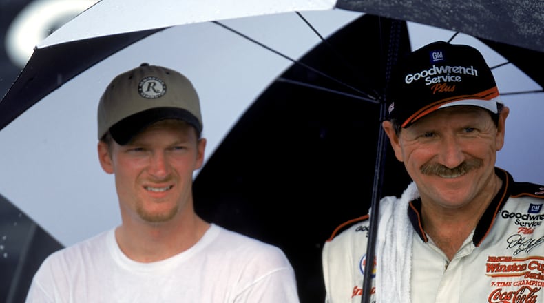 DARLINGTON, SC - SEPTEMBER 3: Dale Earnhardt Jr. and Dale Earnhardt Sr. pose for a photograph after the Pepsi Southern 500 at the Darlington Raceway on September 3, 2000 in Darlington, South Carolina. (Photo by Craig Jones/Getty Images)