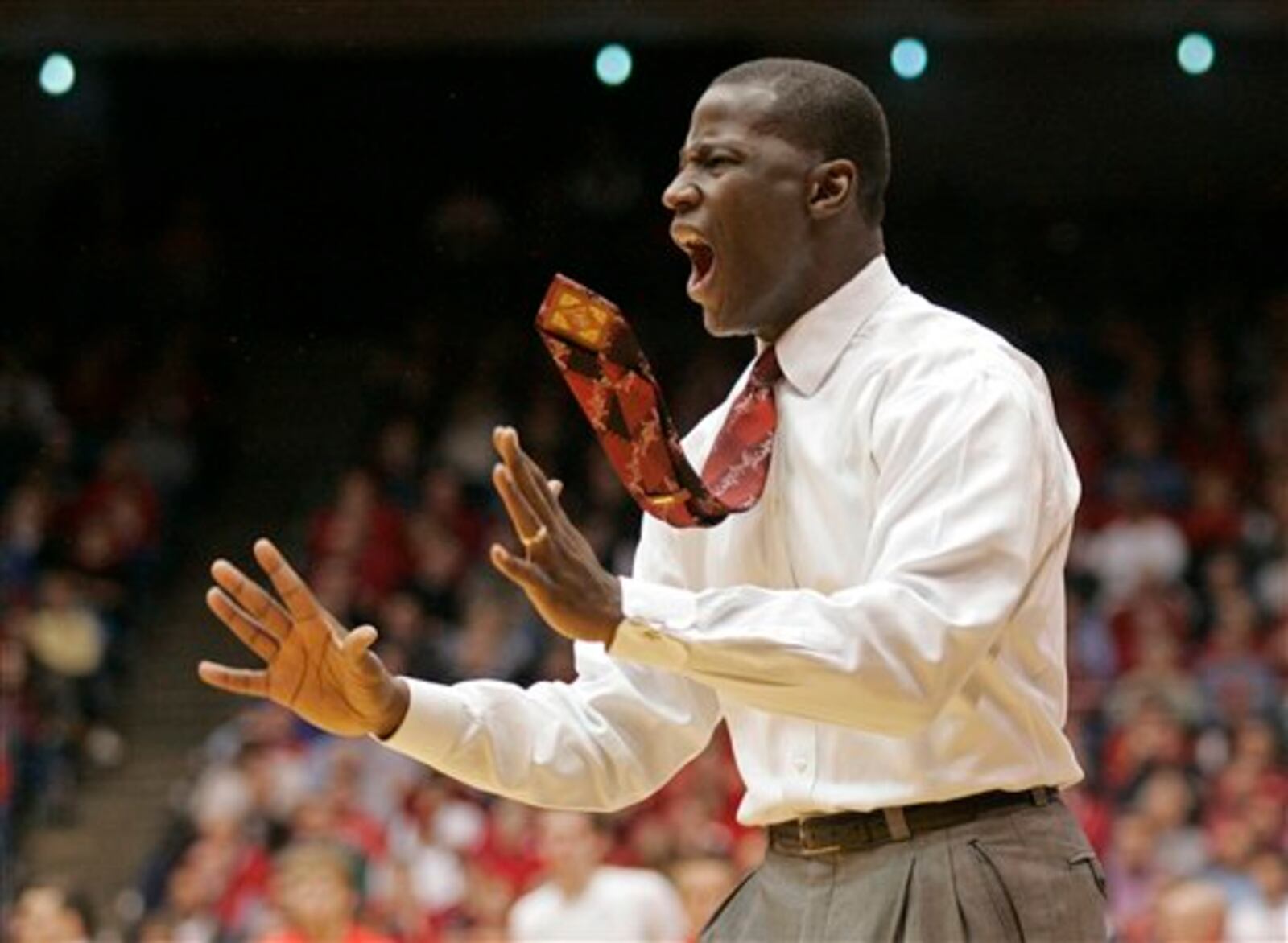 Alabama coach Anthony Grant shouts at his team during the second half of an NCAA college basketball game against Dayton on Wednesday, Dec. 7, 2011, in Dayton, Ohio. Dayton defeated Alabama 74-62. Grant played for Dayton in the 1980s. (AP Photo/Skip Peterson)