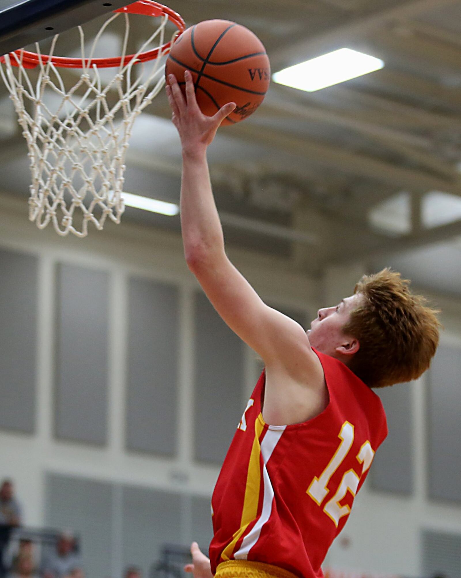 Fenwick guard C.J. Hurley drives to the hoop for two points Saturday during Division II sectional play against Franklin at Fairmont’s Trent Arena. CONTRIBUTED PHOTO BY E.L. HUBBARD