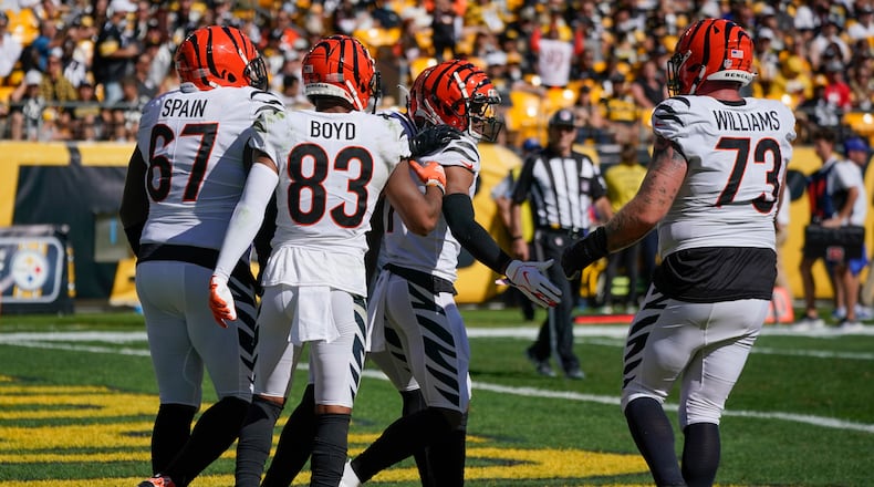 Cincinnati Bengals wide receiver Ja'Marr Chase (1) celebrates with teammates after he caught a touchdown pass against the Pittsburgh Steelers during the second half an NFL football game, Sunday, Sept. 26, 2021, in Pittsburgh. (AP Photo/Gene J. Puskar)