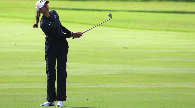 Centerville senior Marissa Wenzler hits a shot during Saturday’s Division I state tournament at Ohio State University Golf Course. Wenzler won the tournament with a 36-hole total of 2-under-par 138. Jeff Gilbert/CONTRIBUTED