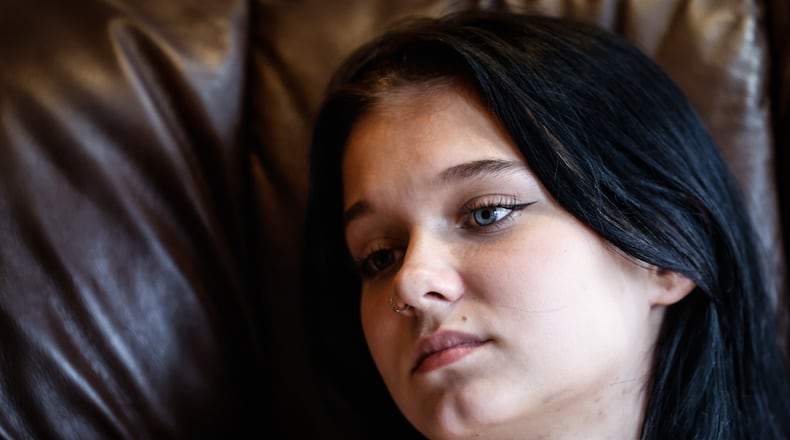Springboro High School student Rhiannon Price struggled with her metal health. Price is now feeling better and hoping her story will help other teenagers who are struggling. JIM NOELKER/STAFF