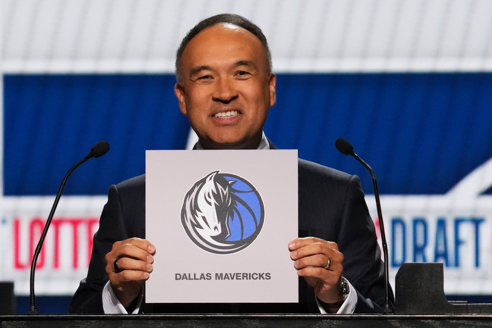 NBA Deputy Commissioner Mark Tatum announces that the Dallas Mavericks won the first pick in the NBA basketball draft lottery in Chicago, Monday, May 12, 2025. (AP Photo/Nam Y. Huh)
