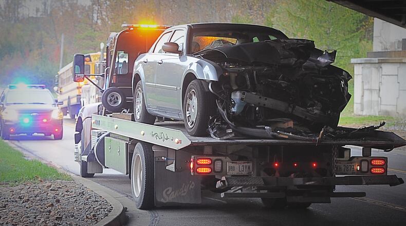 The driver of a car involving in a crash with a school bus suffered non-life-threatening injuries on Wednesday, Oct. 28, 2020. STAFF PHOTO / MARSHALL GORBY
