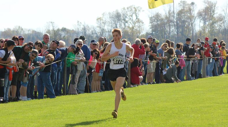 Max Pettit of Greenon ran alone most of the way as he lowered his previous best time of 16:16 by eight seconds in claiming a district cross-country title Saturday. GREG BILLING / CONTRIBUTED