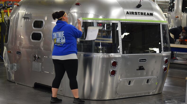 Airstream's Jackson Center operation will grow in late December when travel trailer manufacturing moves into a new 750,000 square-foot, $50 million facility. Production in the new Shelby County facility will begin at the start of the new year. About 960 people work at the Airstream operation in Jackson Center. Workers who manufacture motor homes across the street will move into the former travel trailer manufacturing plant and service will move into the former motor home facility. STAFF PHOTOS / HOLLY SHIVELY