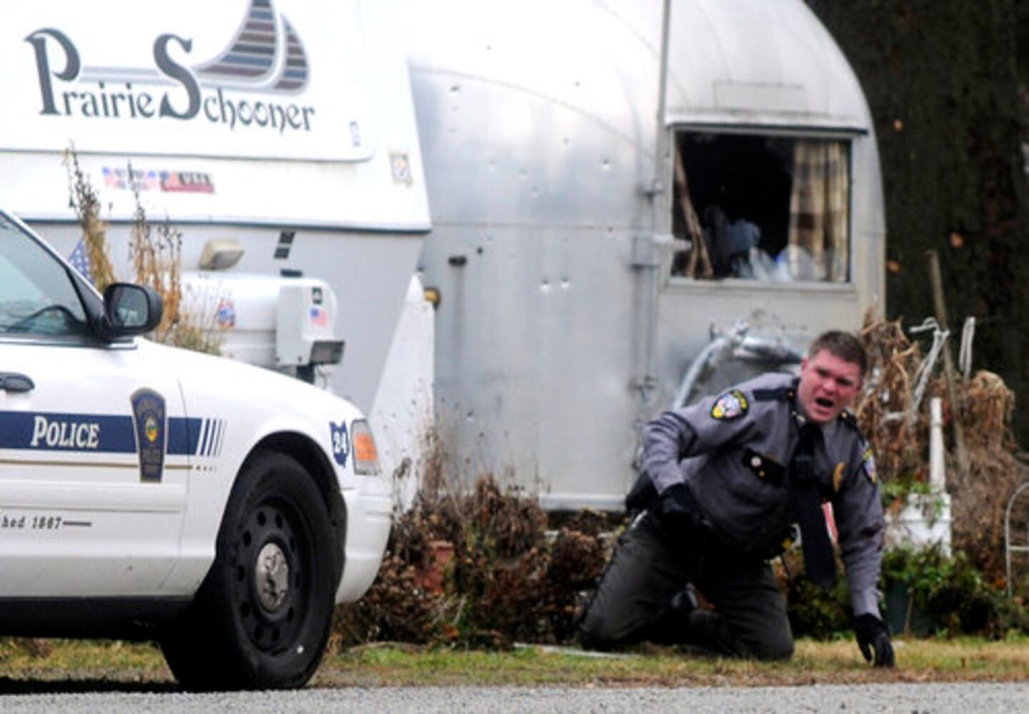 Patrolman shot at Enon Beach