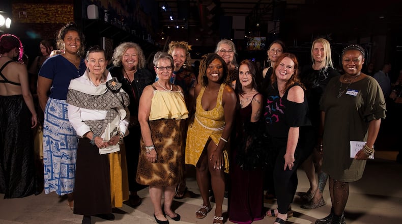 12 local designers competed in Project Clash — a 10-hour marathon sewing competition on Sept. 27 at Bar Granada in Dayton. Pictured (left to right in the back row) is Brittianna Revels, Heidi Coia, Joy Hoover, Anne Fonde Potter, Colleen Hochwalt and Amy Kollar Anderson. Pictured (left to right in the front row) is Linda Tipton, Tursia Turner, Shanice Dorje-Chang, Monaca Hicks, Amy Hamilton and Jacobee Rose Buchanan (PHOTO COURTESY: ERNIE MUELLER).
