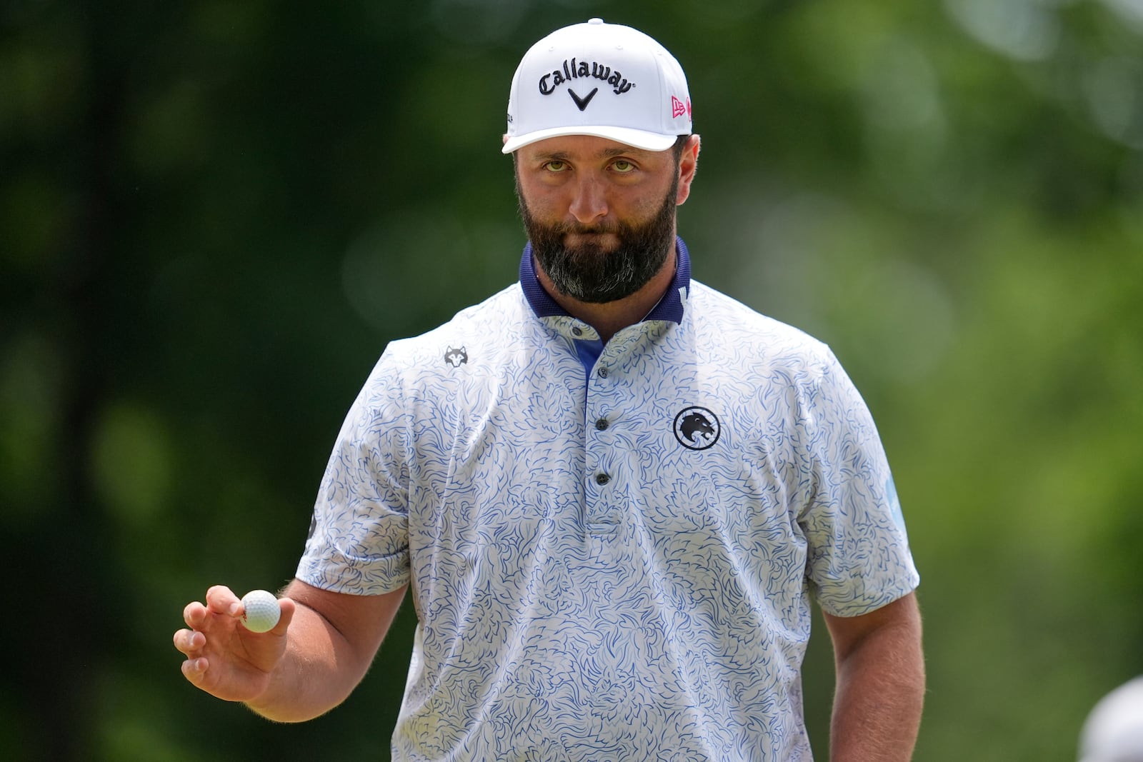 Jon Rahm, of Spain, waves after making a putt on the first hole during the third round of the PGA Championship golf tournament at the Quail Hollow Club, Saturday, May 17, 2025, in Charlotte, N.C. (AP Photo/George Walker IV)