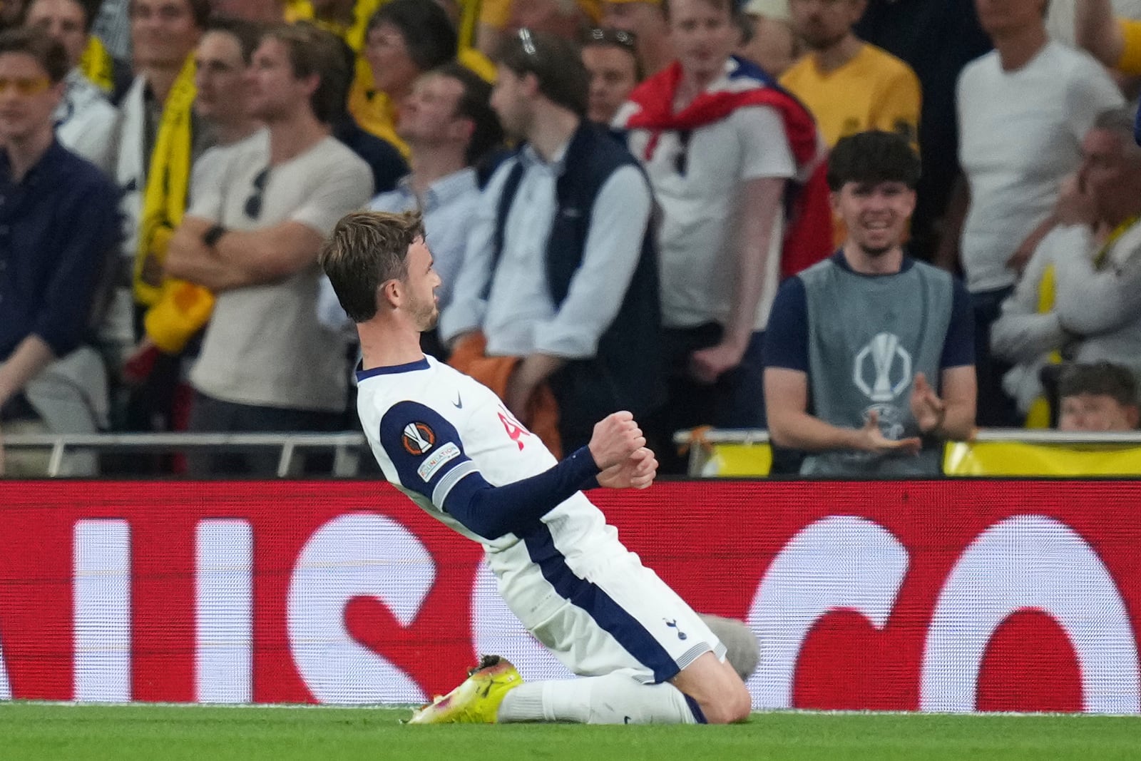 Tottenham's James Maddison celebrates after scoring his side's second goal during the Europa League semifinal first leg soccer match between Tottenham Hotspur and Bodo/Glimt at the White Hart Lane stadium in London, Thursday, May 1, 2025. (AP Photo/Kirsty Wigglesworth)