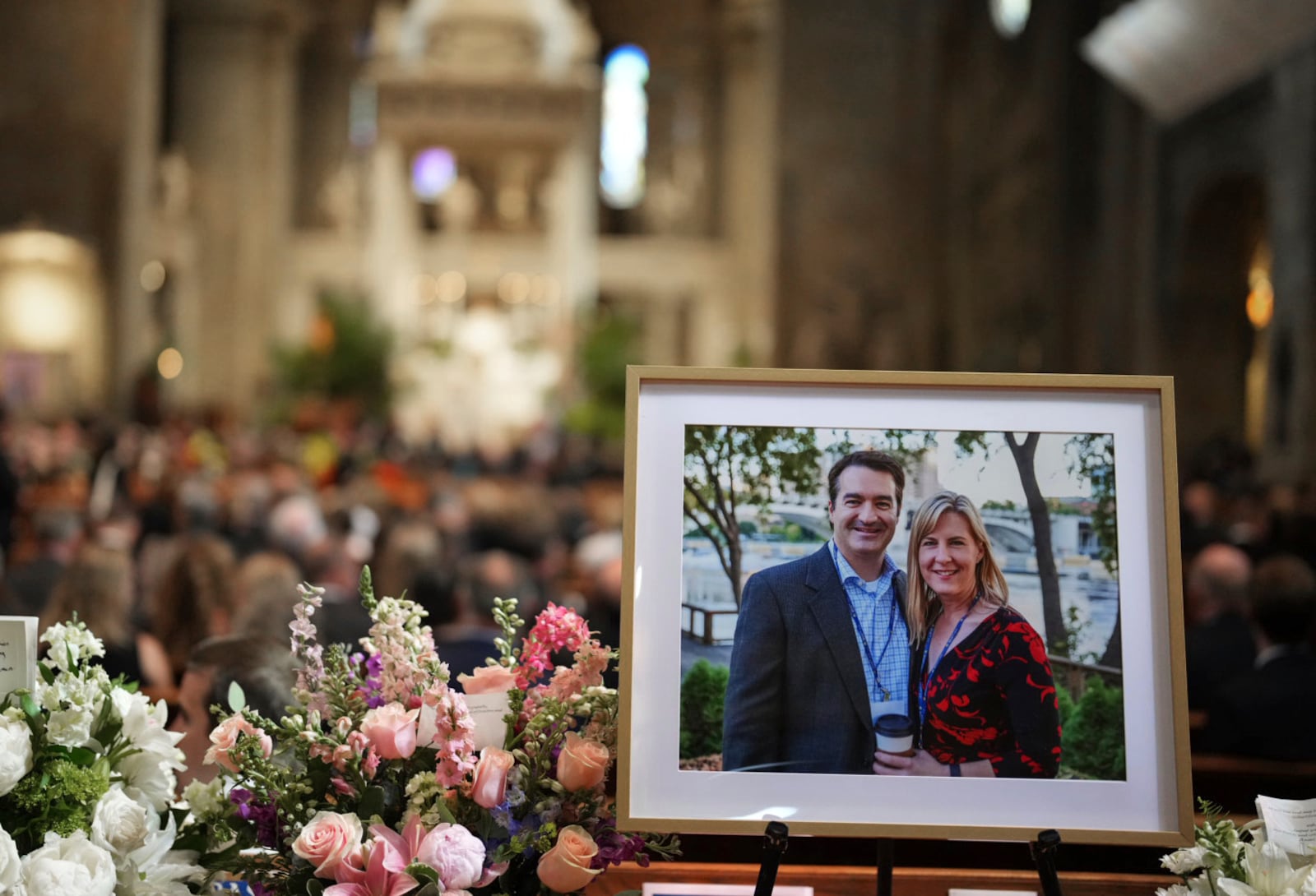 Pictures of Mark and Melissa Hortman are set up inside the sanctuary at the Basilica of St. Mary's during funeral services for Mark and Melissa Hortman in Minneapolis, Minn., on Saturday, June 28, 2025. (Alex Kormann/Star Tribune via AP, Pool)