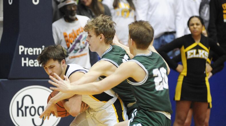 Centerville senior Ryan Marchal (with ball) had a game-high 22 points. Centerville defeated Mason 49-43 in a boys high school basketball D-I district final at UD Arena on Saturday, March 9, 2019. MARC PENDLETON / STAFF