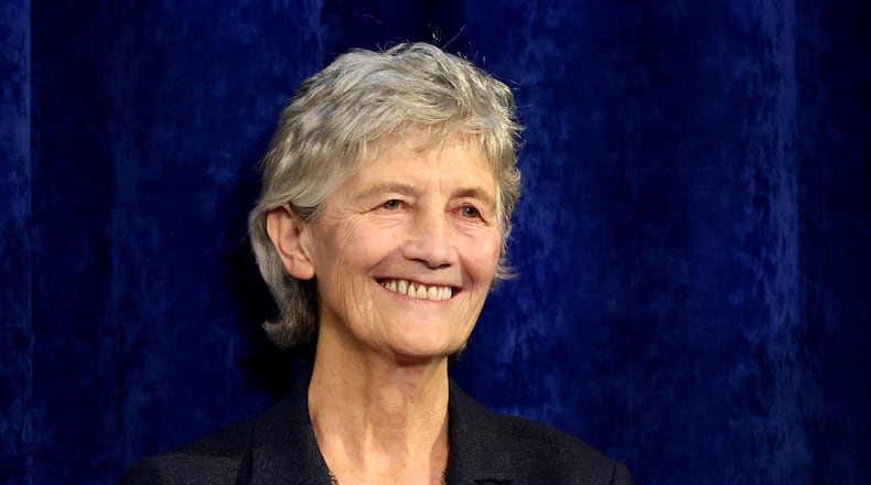 Catherine Connolly smiles to supporters after being elected as the new President of Ireland at Dublin Castle, Ireland, Saturday, Oct. 25, 2025. (AP Photo/Peter Morrison)
