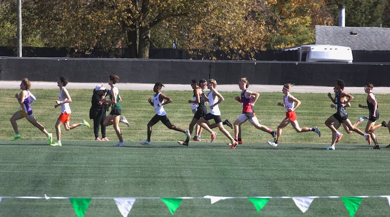 Local cross country runners will be seeking to advance to the state meet at Fortress Obetz in Obetz. DAVID JABLONSKI / STAFF PHOTO