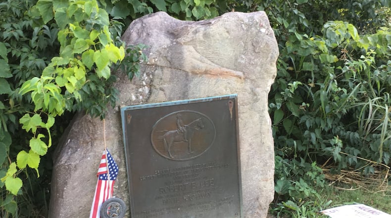 This marker, which had been in Franklin, says it is in remembrance of Confederate Gen. Robert E. Lee and the Dixie Highway. It was removed by the city. ED RICHTER/STAFF