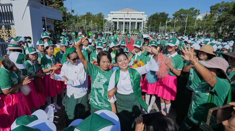 FILE - Supporters of Myanmar's military backed Union Solidarity and Development Party (USDP), dance on the first day of campaign for the upcoming general election, in Naypyitaw, Myanmar, Oct. 28, 2025.(AP Photo/Aung Shine Oo, File)