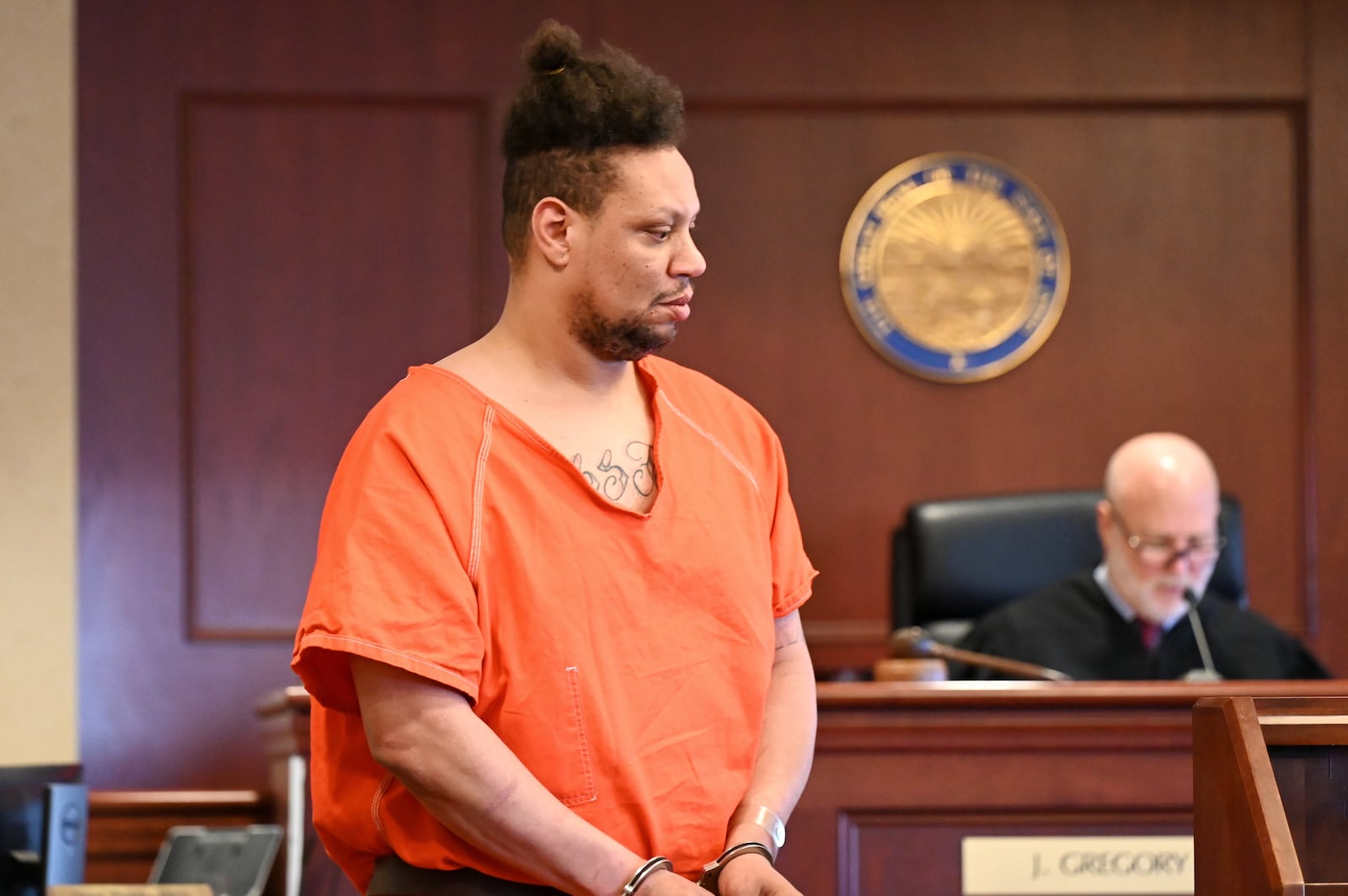 Roger Reed, 41, of Hamilton, is scheduled to have a jury trial in late September on 10 sex-related crimes against children. Reed, pictured here during an arraignment in March in Butler County Common Pleas court, was in indicted on charges including rape, gross sexual imposition and sexual battery. MICHAEL D. PITMAN/FILE