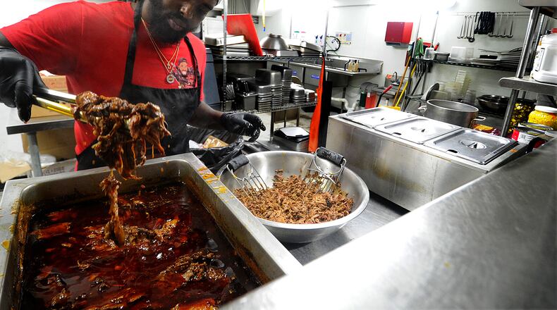 Chef Darion Lewis, prepares taco meat for taco Tuesday Sept. 20, 2022. MARSHALL GORBY\STAFF