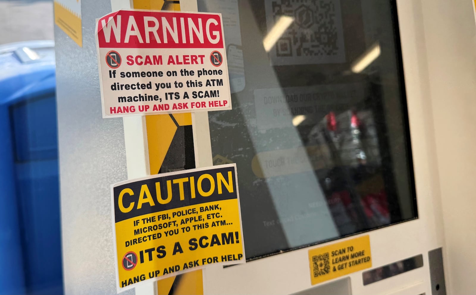 Bitcoin and cryptocurrency scams use ATMs, like this yellow one in a Circle K convenience store on Ohio 4 in Fairfield, which has a sign warning potential users of scams. Bad actors are utilizing these types of machines in scams that defrauds people out of hundreds and even thousands of dollars. MICHAEL D. PITMAN/STAFF