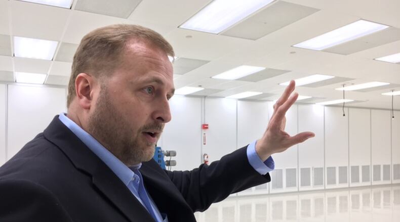 John Busbee, chief executive of Xerion Advanced Battery Corp., in a space at the Miami Valley Research Park that his company may use for manufacturing. THOMAS GNAU/STAFF