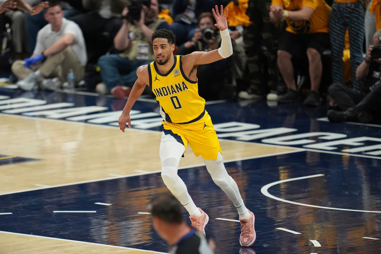 Indiana Pacers guard Tyrese Haliburton celebrates a basket against the Oklahoma City Thunder during the first half of Game 6 of the NBA Finals basketball series, Thursday, June 19, 2025, in Indianapolis. (AP Photo/Michael Conroy)