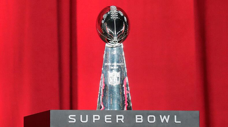 HOUSTON, TX - JANUARY 30: The Vince Lombardi Trophy is seen onstage during Super Bowl 51 Opening Night at Minute Maid Park on January 30, 2017 in Houston, Texas. (Photo by Tim Warner/Getty Images)