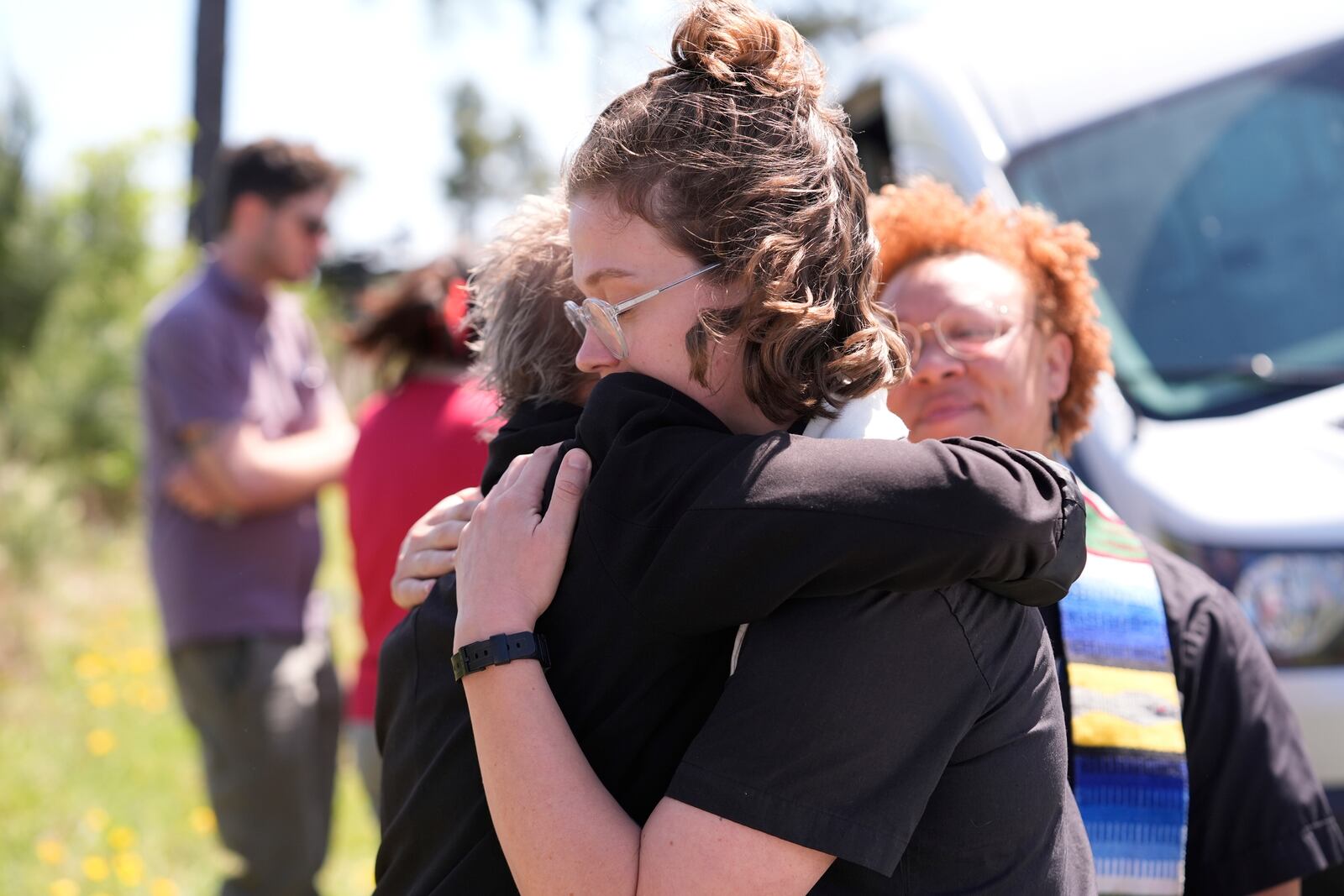Clergy hug outside the Central Louisiana ICE Processing Center in Jena, La., after an immigration hearing for Mahmoud Khalil, the Columbia University activist facing deportation for his role in pro-Palestinian campus protests, Friday, April 11, 2025. (AP Photo/Gerald Herbert)