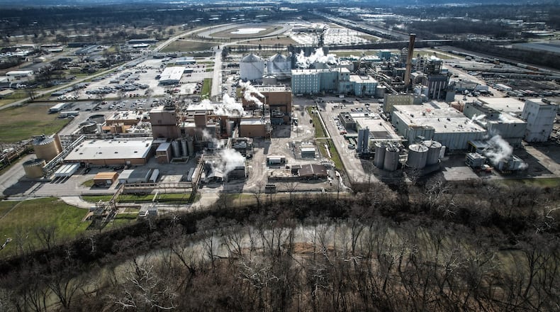 In late 2023, corn gluten meal spilled from the Cargill plant in North Dayton into a channel of the Great Miami River (seen at bottom of photo). JIM NOELKER/STAFF